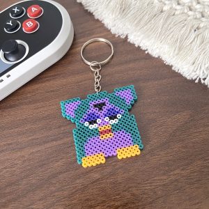 Porte-clés pixel art créature interactive rétro